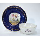 An English 18th century porcelain cabinet plate, royal blue ground with a gilt foliate band,