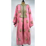 An elegant Indian, pink-ground Sherwani,