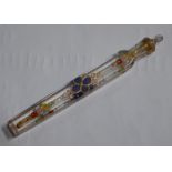 An antique tapering cylindrical scent bottle inlaid with polychrome enamel decoration,