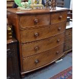 A Victorian flame mahogany bowfront chest of two short over three long graduated cockbeaded drawers,