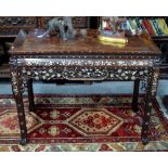 An antique Chinese mother-of-pearl inlaid rosewood center table, decorated with floral designs,
