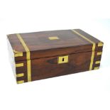 A brass-bound rosewood writing slope with fitted interior,