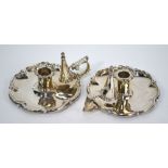 A pair of George IV silver chambersticks with detachable grease-pans,