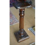 A late 19th century gadrooned moulded jardiniere stand on square platform base,