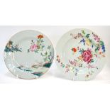 Two famille rose porcelain Chinese plates: one decorated with two quadrupeds in a landscape;
