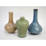 Three small Chinese monochrome vases, comprising: a blue glazed vase with circular neck,