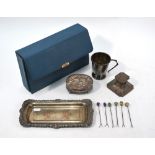 A silver and basse-taille blue enamel four-piece brush set in folding blue leather case,