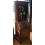 An 18th century and later walnut bureau bookcase,