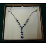 A blue and white paste set necklace,