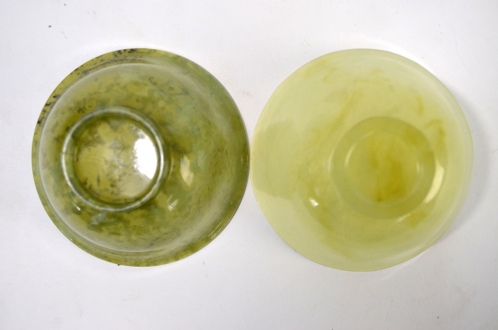 Two Chinese, semi-translucent mottled-green stone bowls; each one on a circular foot. - Image 3 of 10