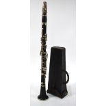 A vintage ebony clarinet with nickel mounts,