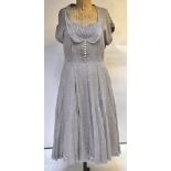 A 1940s pale grey fine cotton voile dress with embroidered white dots,