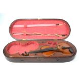 A scarce 19th century mahogany violin double case with brass loop handle and fitted lining,