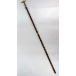 A marching banner staff, surmounted by a brass spread eagle,