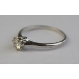 A single stone brilliant cut diamond ring, in claw setting, stamped PLAT, approx 0.