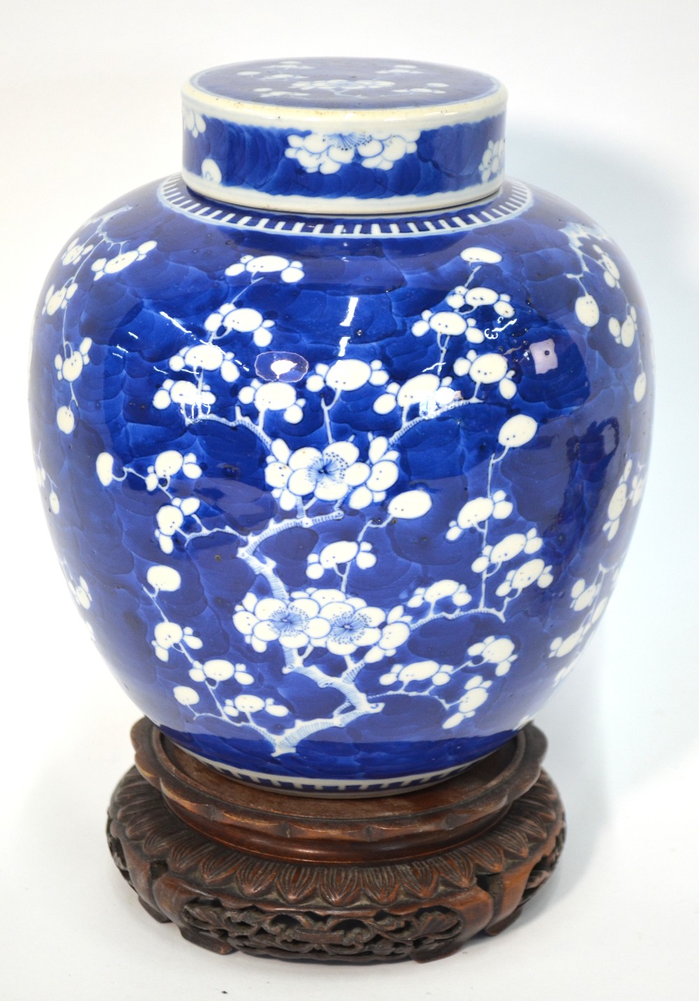 A blue and white, Chinese porcelain, oviform prunus jar and cover,