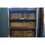 An extensive selection of 75 leather-bound volumes, mostly foreign language,