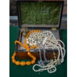 Two boxes of mixed vintage and later jewellery including simulated pearls, simulated amber,