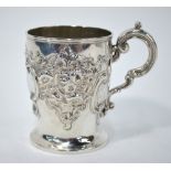 A Victorian silver baluster Christening mug with chased and embossed floral and scroll decoration,