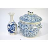 A blue and white porcelain Kamcheng with domed cover decorated with floral and foliage designs,