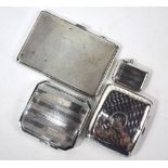 A heavy quality engine-turned silver cigarette case, Birmingham 1941,