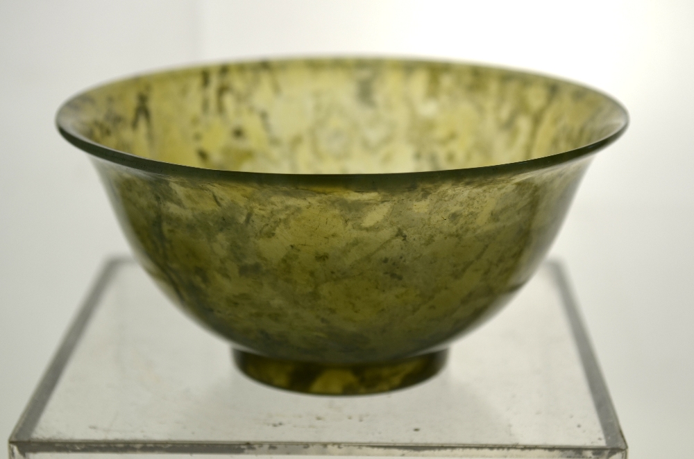 Two Chinese, semi-translucent mottled-green stone bowls; each one on a circular foot. - Image 10 of 10