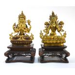 An associated pair of gilded metal Tantric figures: one probably Avalokitesvara Shadakshari,