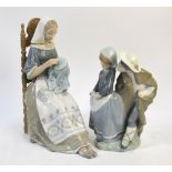 Two Lladro figurines - Lady seated and embroidering, 28 cm h. and a young couple, 22 cm h.