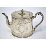 A Victorian engraved silver cylindrical teapot with pineapple finial,