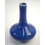 A blue monochrome, Chinese vase with cylindrical neck and squat oviform body, 20cm high,