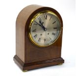 A walnut dome cased 8-day mantel clock, the movement stamped WBK & Fils, Paris with silvered dial,