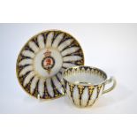 An armorial porcelain cup and saucer fro