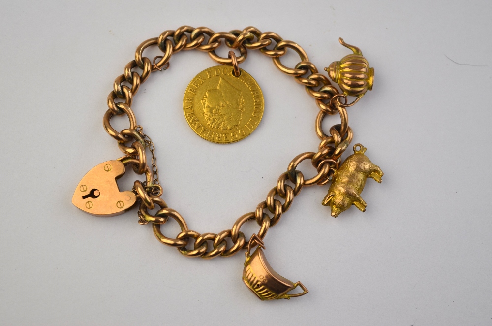 A rose gold curb bracelet having 9ct pad