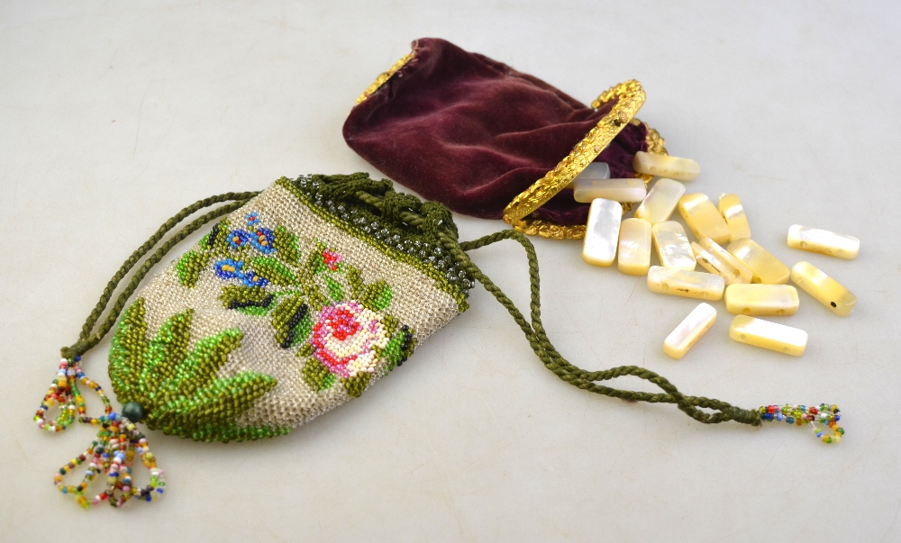 A Victorian floral beaded reticule to/w velvet reticule having pinchbeck base and frame (2)