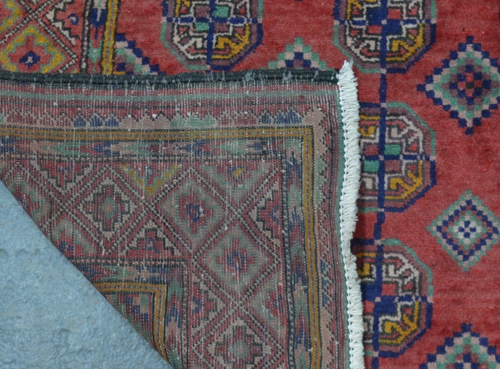 A Belouch rug, the three linked gul desi - Image 2 of 2