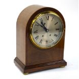 A walnut dome cased 8-day mantel clock,