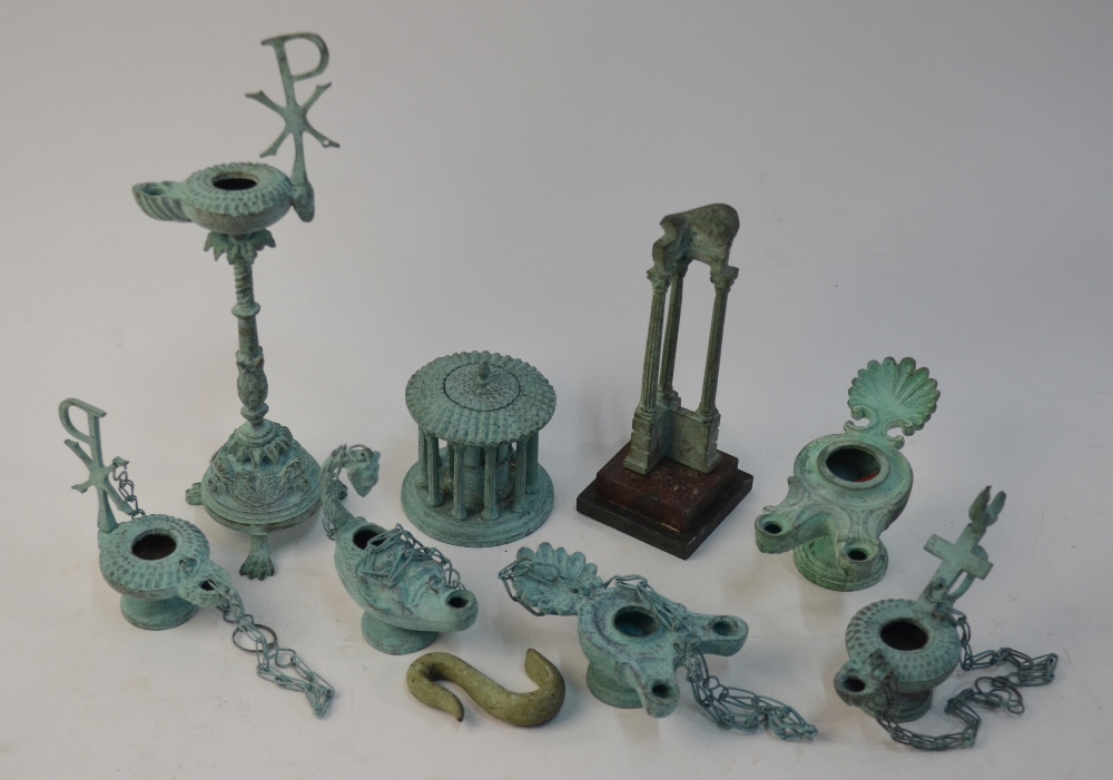 Six various verdigris-patinated bronze reproduction Roman oil lamps to/w a similar miniature ruined