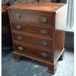 A small Victorian style mahogany chest of four long drawers with brass fittings,
