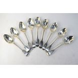 A set of nine Victorian silver fiddle pattern dessert spoons, Chawner & Co.
