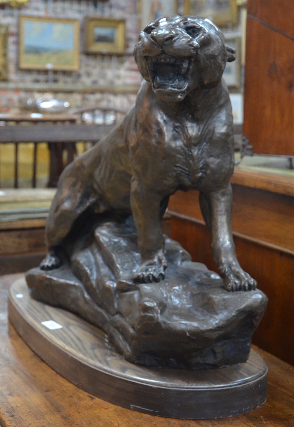 A large contemporary bronze finished composite cast sculpture of a puma, - Image 2 of 5