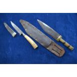 A 19th century Continental knife with 11 cm steel blade, ribbed ferrule and antler handle,