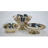 A silver bowl with wavy rim and stemmed foot, Birmingham 1904, to/w an oval stemmed bowl,