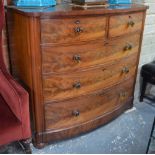 A Victorian mahogany bowfront chest of two short over three long graduated drawers,