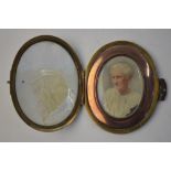 An oval portrait miniature of an old lady, circa 1900,