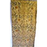 An early 20th century Arts & Crafts style silk and metalised thread panel,