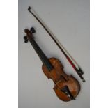 An unusual Dancemaster's kit fiddle (small violin) with single-piece flame mahogany 21.