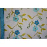 Two Harlequin Delphin roman blinds with trailing stitch-work floral/foliate design in blues and