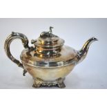 A Victorian compressed melon silver teapot with finial cast as a lurcher,