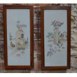 A pair of rectangular, famille rose plaques; each one decorated with a floral arrangement,