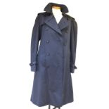 A lady's navy blue Burberrys' trench coat with belt and belt detail to cuffs,
